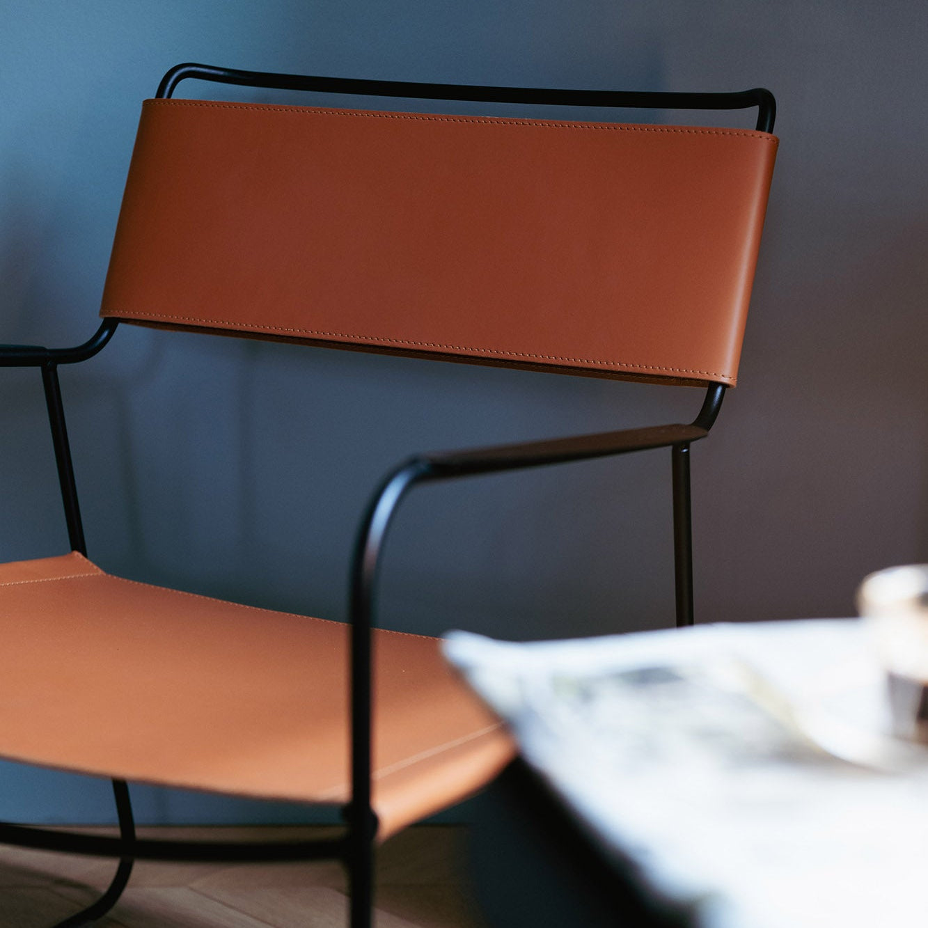SURPRISING LEATHER LOW ARMCHAIR