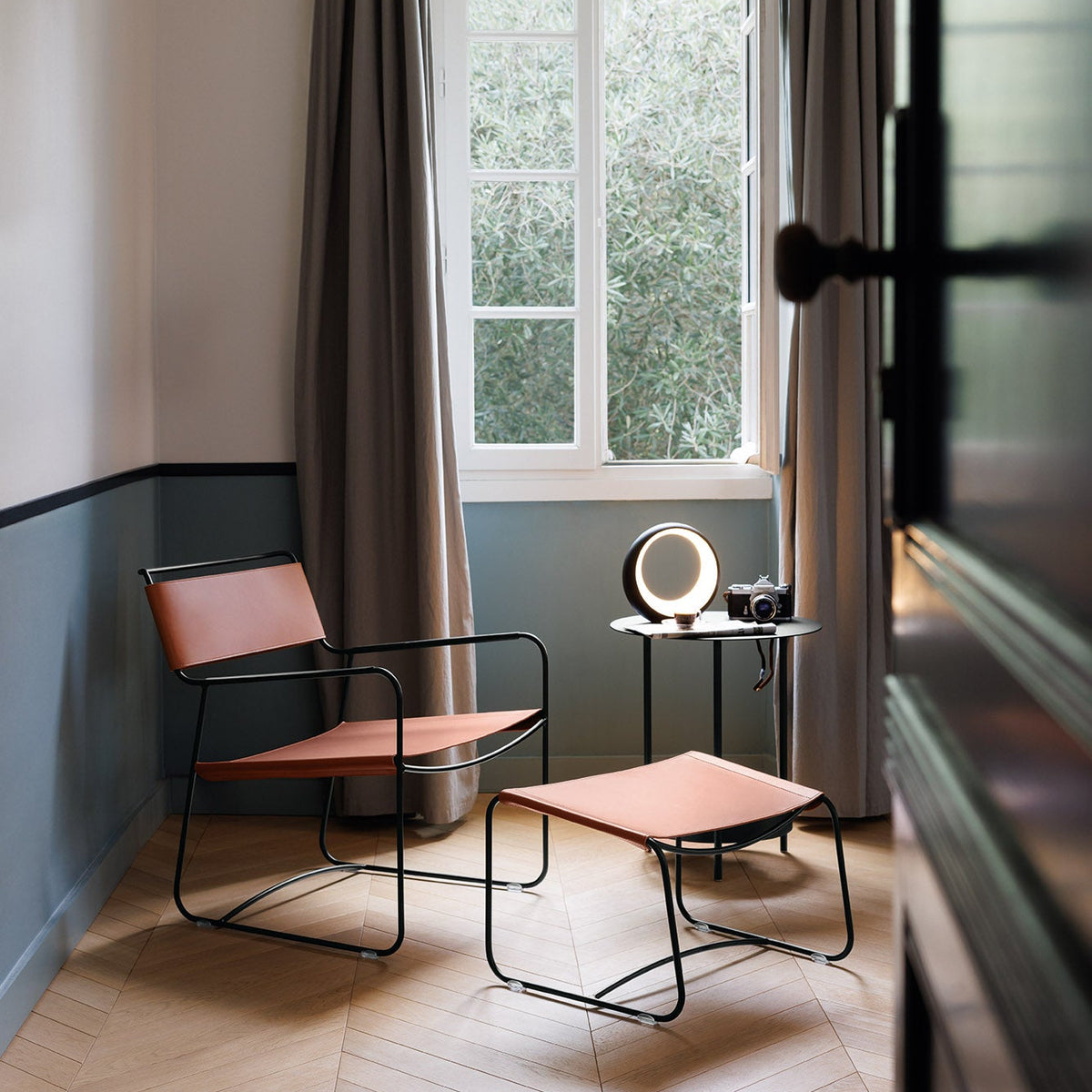 SURPRISING LEATHER LOW ARMCHAIR